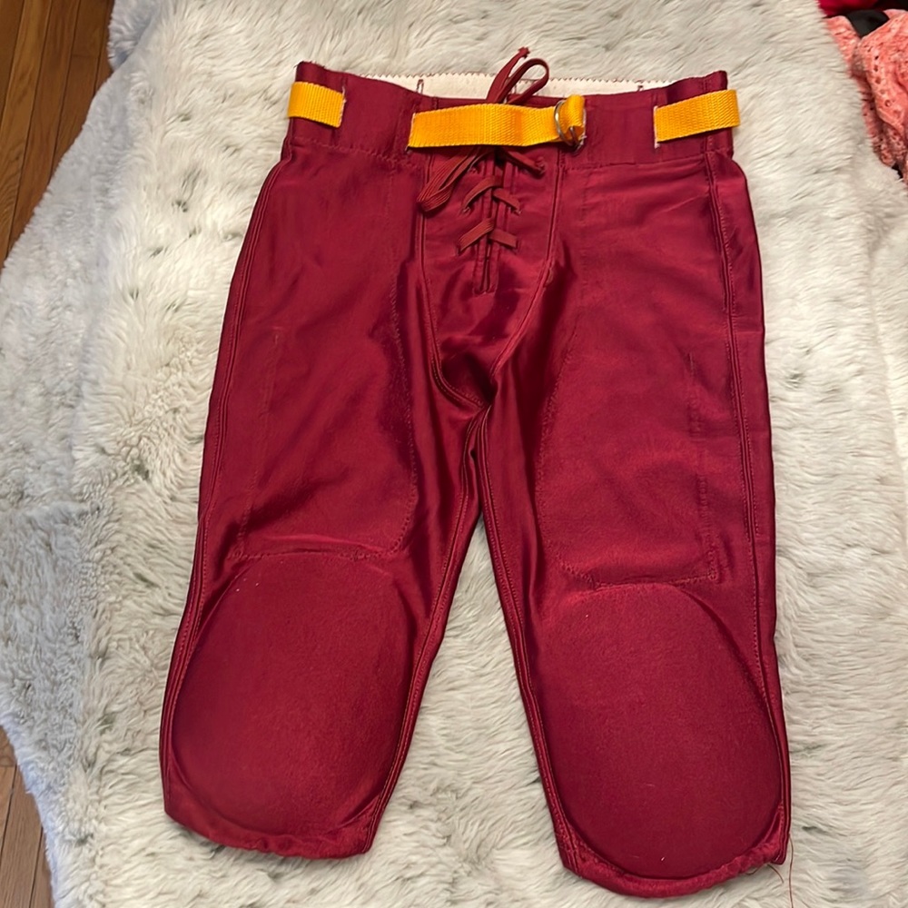 Youth football pants with knee pads